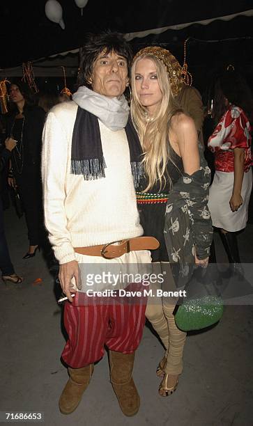 Musician Ronnie Wood and model Theodora Richards, Keith Richards's daughter, attend the Rolling Stones after show party at Wood's home on August 20...