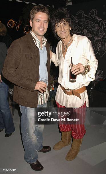 England football player Michael Owen and musician Ron Wood attend the Rolling Stones after show party at Wood's home on August 20 in Kingston England.