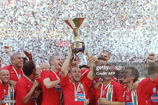 - Picture taken 14 May 2006 of Juventus forward Alessandro Del Piero holding the Italian serie A cup after Juventus retained the Italian league...