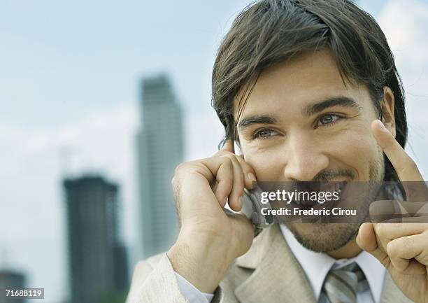 businessman using cell phone - shaking finger stock pictures, royalty-free photos & images