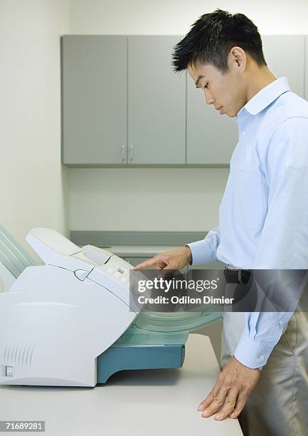 2,410 Person By Fax Machine Stock Photos, High-Res Pictures, and Images ...