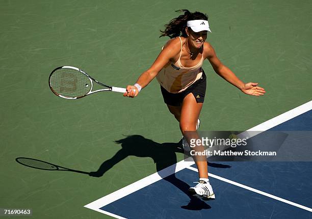 Ana Ivanovic of Serbia & Montenegro lunges for a shot against Martina Hingis of Switzlerland during the final of the Coupe Rogers at Stade Uniprix...