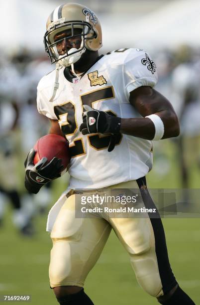 Running back Reggie Bush of the New Orleans Saints warms up before a preseason game against the Dallas Cowboys on August 21, 2006 at Independence...
