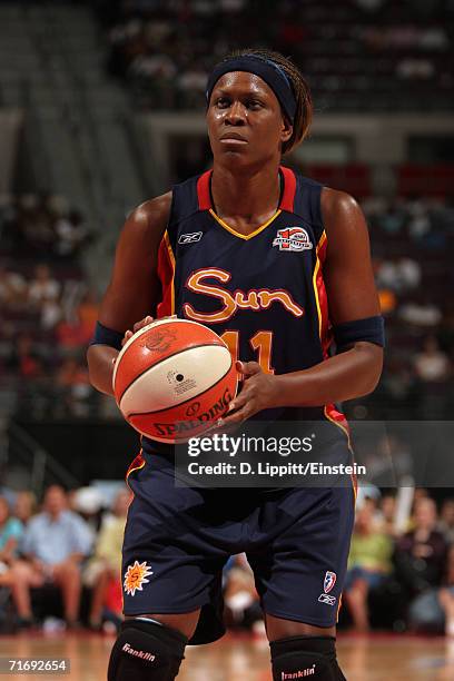 Taj McWilliams-Franklin of the Connecticut Sun prepares to shoot a free throw during a game against the Detroit Shock at the Palace of Auburn Hills...