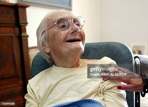 Marie-Simone Capony is pictured, 22 August 2006 at home in Cannes, south eastern France. This 112-year-old woman has become France's oldest citizen,...