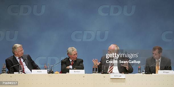 Roland Koch, governor of the German state of Hessen, Hans Barbier, chairman of the board of the Ludwig Erhard Foundation, Georg Milbradt, governor of...