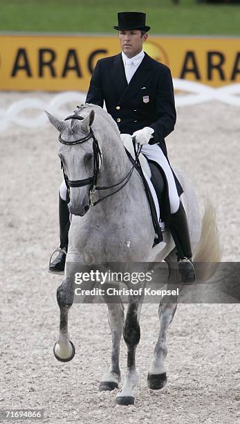 Gunter Seidel of the USA rides on Aragon during the first day of the Dressage Grand Prix at the World Equestrian Games on August 22, 2006 in Aachen,...