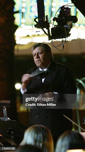 Entertainer Jerry Lewis conducts the Las Vegas Philharmonic on the Strip as he tapes the show opener for the 41st annual Labor Day Telethon to...