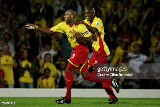 Marlon King of Watford celebrates scoring the first goal of the game with team mate Damien Francis during the Barclays Premiership match between...