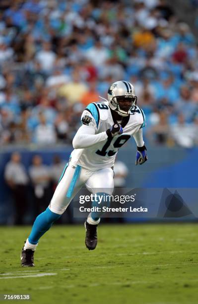 Wide receiver Keyshawn Johnson of the Carolina Panthers runs during the preseason game against the Buffalo Bills on August 12, 2006 at Bank of...