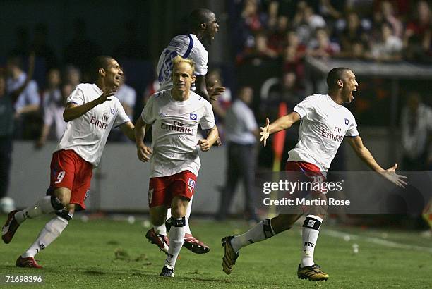 Nigel de Jong of Hamburg celebrates after scoring the first goal during the UEFA Champions League qualification round third round match between CA...