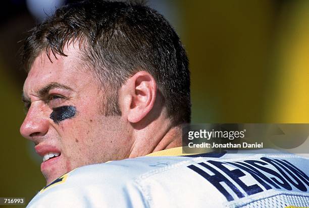 Close up of Quarterback Drew Henson of the Michigan Wolverines as he looks on from the bench during the game against the Purdue Boilermakers at the...