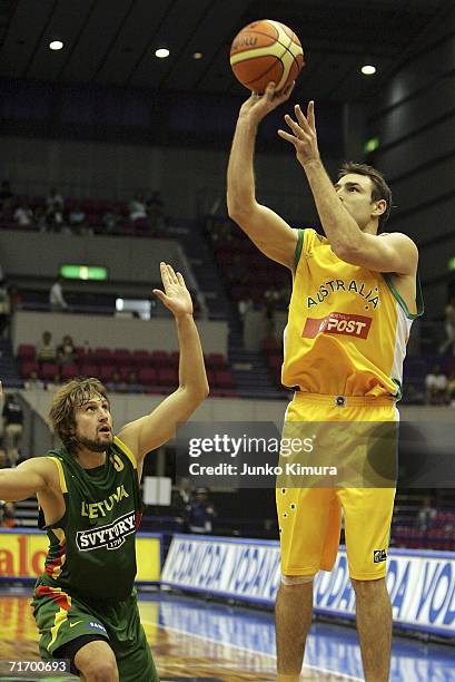 Jason Smith of Australia shoots against Lithuania during the preliminary round of the 2006 FIBA World Championships on August 23, 2006 at hamamatsu...
