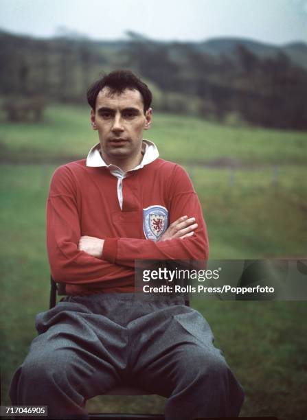 Scottish international footballer and striker with Tottenham Hotspur FC, Alan Gilzean posed prior to a training session with the national side in...