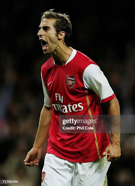 Mathieu Flamini of Arsenal celebrates scoring a late during the UEFA Champions League Qualification Third qualifying round second leg match between...