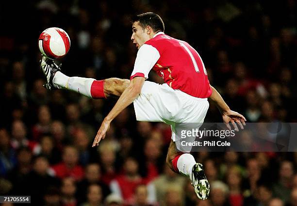Robin Van Persie of Arsenal in action during the UEFA Champions League Qualification Third qualifying round second leg match between Arsenal and...
