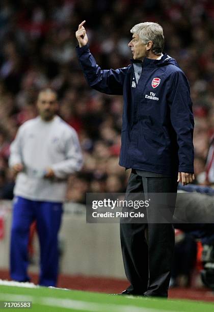 Arsenal Manager Arsene Wenger gives instructions from the sidelines during the UEFA Champions League Qualification Third qualifying round second leg...