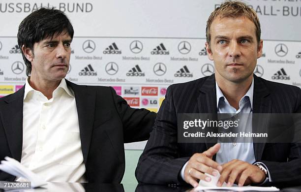 Assistant coach Hans-Dieter Flick and Headcoach Joachim Loew are seen during the DFB press conference to announce the new assistant coach of the...