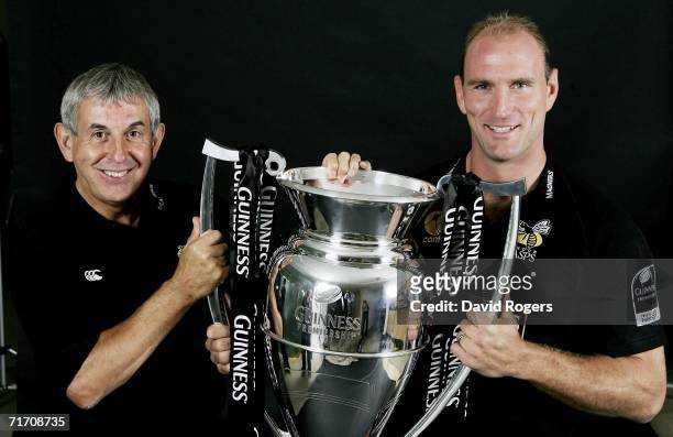 Lawrence Dallaglio captain of London Wasps and London Wasps Director of Rugby Ian McGeechan pose with the Guinness Premiership Trophy during the...