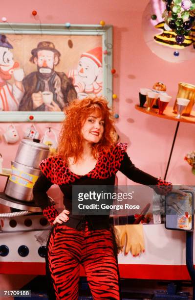Julie Brown, comedian and host of MTV's "Just Say Julie" show, poses during a 1989 Hollywood, California, photo portrait session. Brown was riding...