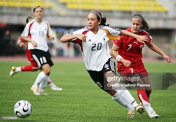 Nadine Kessler of Germany tackles Vanessa Buerki of Switzerland during the FIFA Women's Under 20 World Championships Group C match between Germany...