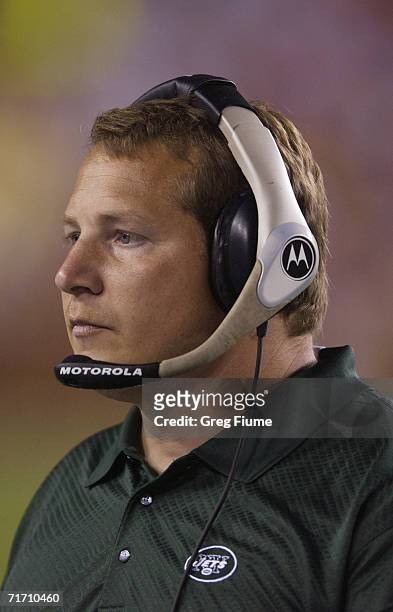 Head coach Eric Mangini of New York Jets looks on during the NFL game against the Washington Redskins August 19, 2006 at FedEx Field in Landover,...