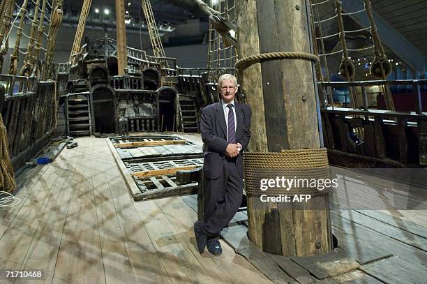 Museum director Klas Helmerson poses by the mainmast of Swedish 17th century royal warship Vasa on drydock in Stockholm August 24, 2006. Fifty years...