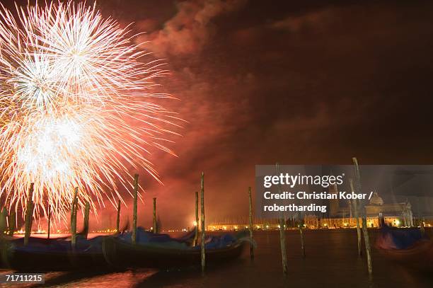 carnival fireworks, gondolas on waterfront at night, san giorgio maggiore, venice, unesco world heritage site, veneto, italy, europe - blaring stock pictures, royalty-free photos & images