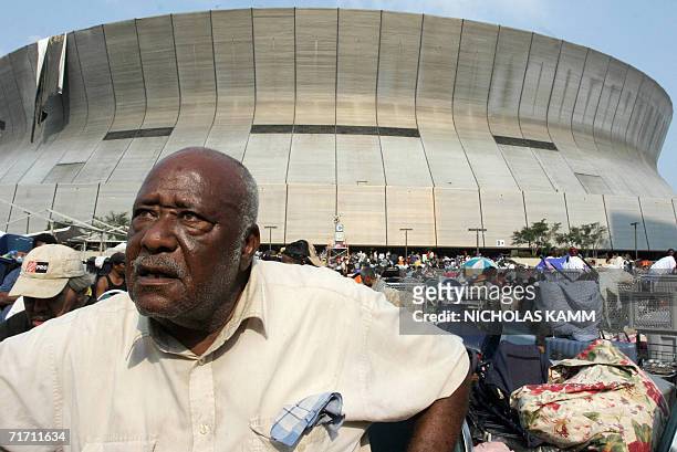 New Orleans, UNITED STATES: : This 03 September 2005 file photo shows John Riley who was suffering from diabetes, sitting outside the Superdome in...