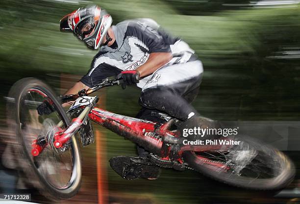 Chris Kovarik of Australia takes to the air during a downhill training run on the slopes of Mount Ngongotaha on day four of the Mountain Bike World...