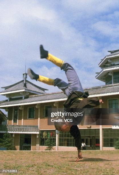 Kungfu Monks exercise on August 09, 2006 in in the Shaolin Temple on Mount Songshan at Dengfeng in Henan Province, China. Shaolin Kungfu or Shaolin...