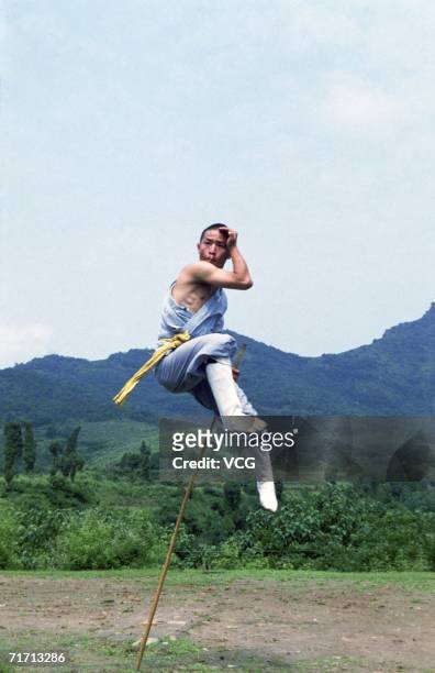 Kungfu Monks exercise on August 09, 2006 in in the Shaolin Temple on Mount Songshan at Dengfeng in Henan Province, China. Shaolin Kungfu or Shaolin...