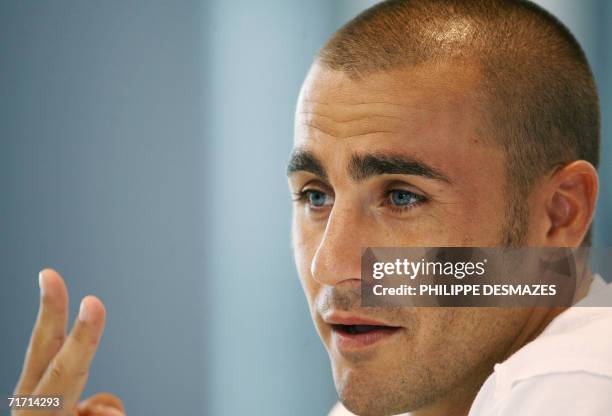 New Real Madrid player, Italian Fabio Cannavaro gives a press conference after a training session of his team 25 August 2006, in Madrid. The...