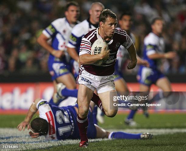 Matt Orford of the Sea Eagles makes a break during the round 25 NRL match between the Manly Warringah Sea Eagles and the Bulldogs at Brookvale Oval...