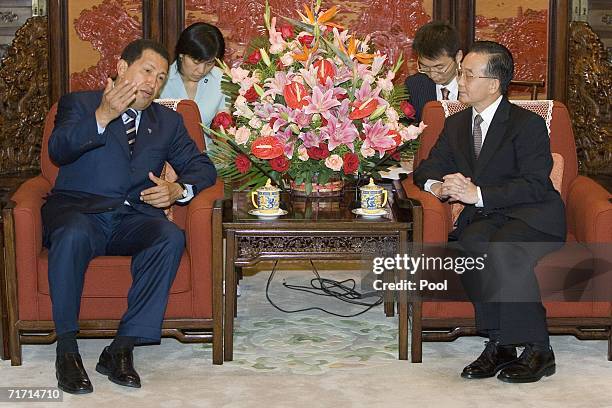 Venezuelan President Hugo Chavez meets with Chinese Premier Wen Jiabao at the Zhongnanhai leaders compound August 25, 2006 in Beijing, China. Chavez...