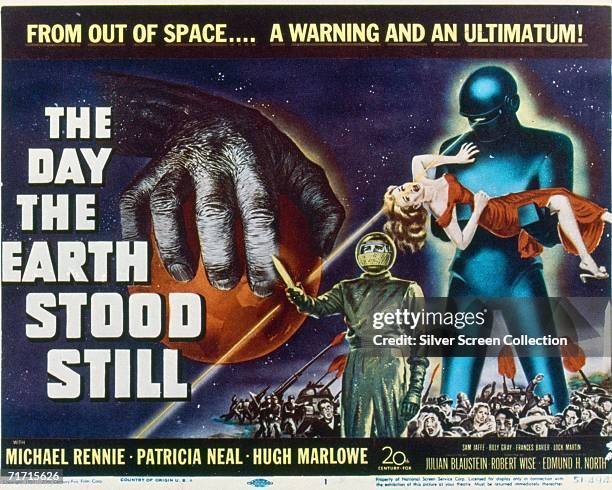 Michael Rennie as Klaatu, followed by the powerful robot Gort on the poster for science fiction classic 'The Day the Earth Stood Still', 1951....