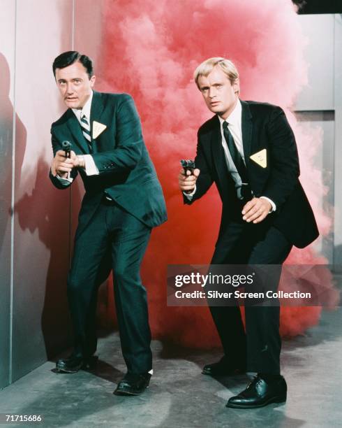 Robert Vaughn as Napoleon Solo and David McCallum as Illya Kuryakin in popular TV series 'The 'Man from U.N.C.L.E.', circa 1965.