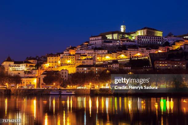 portugal, centro region, coimbra, panorama of coimbra across mondego river - mondego stock pictures, royalty-free photos & images