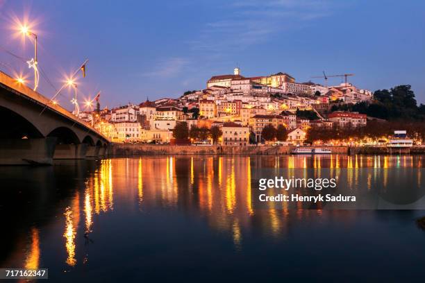 portugal, coimbra, panorama of coimbra across mondego river - mondego stock pictures, royalty-free photos & images