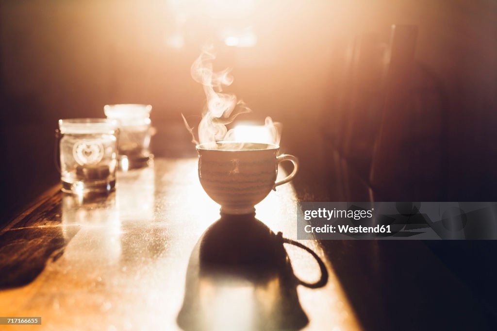 Hot cup of tea in the morning light