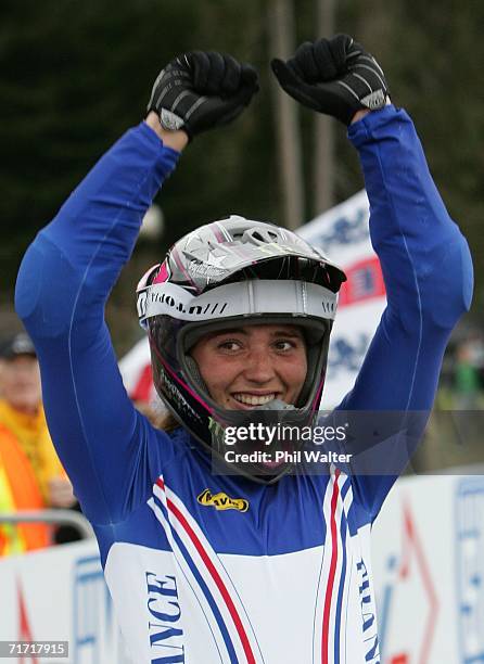 Sabrina Jonnier of France celebrates winning the Women's Downhill competition on the slopes of Mount Ngongotaha on day five of the Mountain Bike...