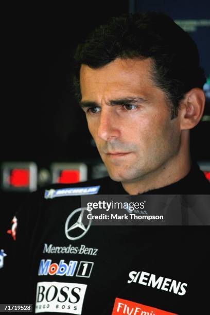 Pedro de la Rosa of Spain and McLaren-Mercedes watches in the pits during practice prior to qualifying for the Turkish Formula One Grand Prix at the...