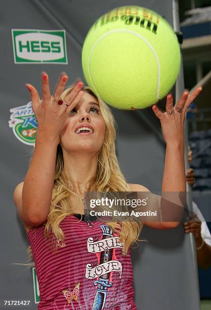 Singer Cheyenne Kimball poses before performing on Arthur Ashe Kid's Day at the USTA National Tennis Center in Flushing Meadows Corona Park on August...