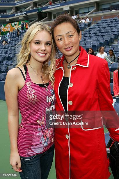 Singer Cheyenne Kimball poses with Mary Park on Arthur Ashe Kid's Day at the USTA National Tennis Center in Flushing Meadows Corona Park on August...
