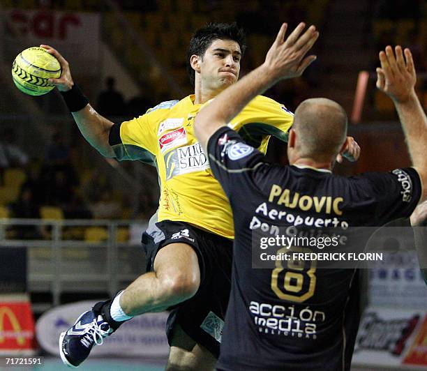 Chambery's Nenad Vuckovic is about to shoot at the goal despite Ciudad's Pajovic during the Eurotournament handball match Chambery vs. Ciudad Real,...