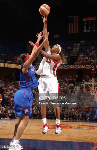 Asjha Jones of the Connecticut Sun shoots against the Detroit Shock in game two of the second round of the WNBA playoffs on August 26, 2006 at...