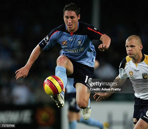 Mark Milligan of Sydney FC controls the ball during the round one A-League match between Sydney FC and the Central Coast Mariners at Aussie Stadium...