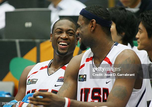 Dwyane Wade and LeBron James of the USA Basketball Mens National Team share a joke on the bench during the FIBA World Basketball Championship match...