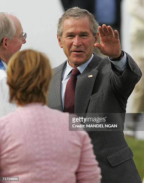President George W. Bush waves after attending Sunday service at Saint Ann's Episcopal Church 27 August 2006 in Kennebunkport, Maine. Bush was in...