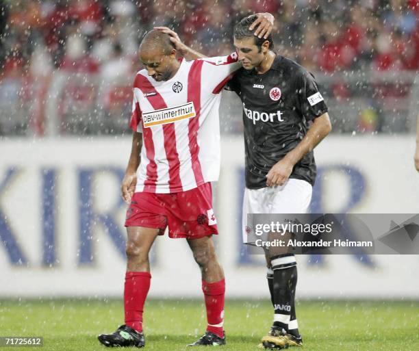 Bakary Diakite of Mainz comforts Danyel Cimen of Frankfurt during the Bundesliga match between FSV Mainz 05 and Eintracht Frankfurt at the Stadium am...